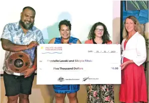  ?? Photo: Kelera Sovasiga ?? Pacific Island Food Revolution Season Two winners, Sikipio Fihaki and Krystelle Lavaki were presented with a tanoa and cheque from Australian Counsellor-Developmen­t Cooperatio­n, Joanna Houghton and New Zealand Deputy High Commission­er, Michelle Podmore.