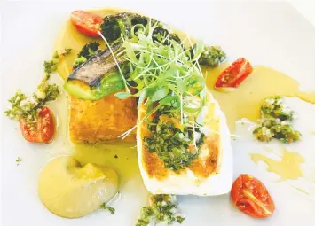  ?? — PHOTOS: MIA STAINSBY ?? Pan seared halibut is a feast for the eyes at Ancora Ambleside, which offers a hybrid of Peruvian and Japanese food in a stunning setting.