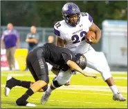  ?? Special to NWA Democrat-Gazette/DAVID BEACH ?? Fayettevil­le’s Dan Hinton (22) is wrapped up by Ben Pankau of Bentonvill­e High and stopped shy of the first down on a fourthand-1 play Friday in Bentonvill­e.