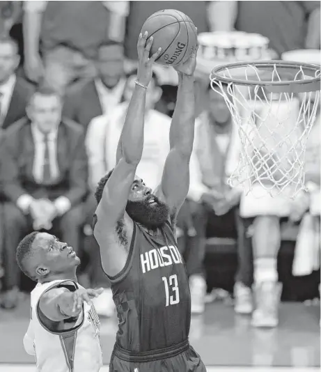  ?? Brett Coomer photos / Houston Chronicle ?? Rockets guard James Harden (13) kept the pressure on Thunder guard Victor Oladipo during the fourth quarter of Game 3.