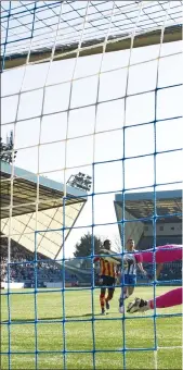  ?? ?? Kyle Lafferty’s free-kick from the edge of the box sails in