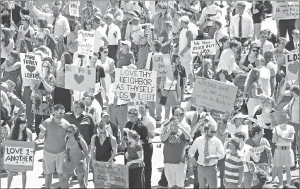  ?? RICK BOWMER/AP FILE ?? Members of Mormons Building Bridges march during the Utah Gay Pride Parade, in Salt Lake City.