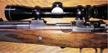  ??  ?? Left-side view of the action of the custom-made kurz- actioned M98 chambered in .250/3 000 Savage. Note the thumb slot in the action’s sidewall and small-ring receiver.