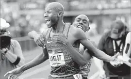  ?? Marcio Jose Sanchez Associated Press ?? BERNARD LAGAT won the 5,000 meters at the trials and will compete in the Olympics for the fifth time, the third time representi­ng the United States.