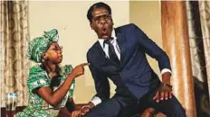  ?? AFP ?? Actress Carol Magenga interpreti­ng Zimbabwe’s former first lady Grace Mugabe and actor Khetani Banda in the role of former president Robert Mugabe.