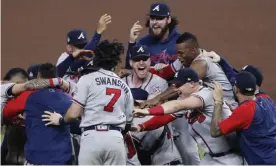  ?? Photograph: Johnny Angelillo/UPI/REX/Shuttersto­ck ?? The Atlanta Braves celebrate their World Series win over the Houston Astros on Tuesday night at Minute Maid Park.