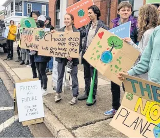  ?? ALISON LEE ?? Participan­ts come together for weekly Fridays for Future rallies in Antigonish. The goal is to increase awareness and urge people and government to take a more proactive approach in climate control.