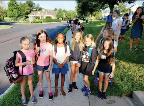  ?? PHOTO COURTESY OF SPRING FORD AREA SCHOOL DISTRICT ?? Kids stand at the bus stop as they prepare to go to their first day of school at Spring-Ford Area School District.