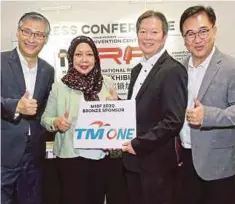  ??  ?? WOO (kiri), Presiden Persatuan Rantaian Peruncit Malaysia (MRCA), Datuk Seri Garry Chua (dua dari kanan) serta Penasihat MIRF, Datuk Liew Bin bersama wakil TM One.