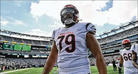  ?? RYAN MEYER / CINCINNATI BENGALS ?? Bengals guard Jackson Carman made six starts and appeared in all 17 games for Cincinnati as a rookie last season. The Fairfield High School graduate, picked by the Bengals in the second round of the 2021 draft, is competing at left guard.