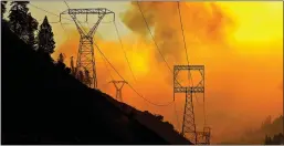  ?? Carolyn Cole
/ Los Angelestim­es/tns ?? California utility companies are shutting off power in some areas this week to help prevent wildfires.