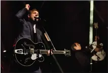  ?? PHOTO BY DREW A. KELLEY ?? Mikel Jollett, left, and Steven Chen of The Airborne Toxic Event performing at the Greek Theatre in 2014. The band will return to perform at the Greek Theatre on Saturday as part of the band’s Hollywood Park Tour.