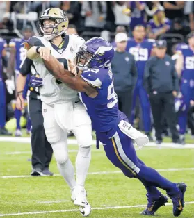  ?? BUTCH DILL/AP ?? Vikings defensive end Danielle Hunter forces a Drew Brees fumble in the second half of a wild-card playoff football game Jan. 5, 2020, in New Orleans.