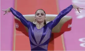  ??  ?? US gymnast McKayla Maroney poses after completing a vault routine at the London Olympics in 2012. Photograph: Julie Jacobson/AP