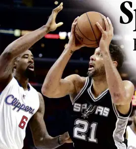  ?? AP ?? SAN ANTONIO Spurs forward Tim Duncan attempts a shot off Los Angeles Clippers center DeAndre Jordan.