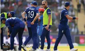  ?? Afghanista­n. Photograph: Gareth Copley/Getty Images ?? Ben Stokes, who is expected to return to face South Africa, talks to teammates during the match against