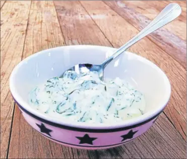  ?? SLATE PHOTO BY LISA LARSON-WALKER ?? To make tzatziki, use whole-milk Greek yogurt and salted cucumbers.