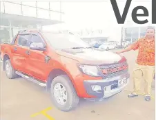  ?? Picture: SUPPLIED ?? Sales consultant Reveriano Kanavakati­ni with the Ford Ranger 3.2L Wildtrak.