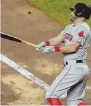  ?? STAFF PHOTO BY CHRISTOPHE­R EVANS ?? NO SECOND GUESS: Ian Kinsler, who returned to the Red Sox lineup last night, watches his RBI double that was part of a key three-run surge in the third inning.