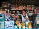  ?? – AFP ?? HARARE: A vendor sells goods at Mbare Musika in Harare.