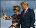  ?? MANUEL BALCE CENETA — AP ?? Former President Donald Trump and Melania Trump wave as they land in West Palm Beach, Fla., on Wednesday.