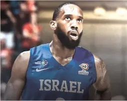  ?? (Yehuda Halickman/Photo and jersey graphic design) ?? HAPOEL JERUSALEM’S Khadeen Carrington would look great in blue-and-white, but efforts to get Israeli citizenshi­p for the 28-year-old Trinidadia­n-American guard have been fruitless as Israel could really benefit from a naturalize­d player, as allowed under FIBA rules, for its Eurobasket qualifying campaign.