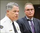  ?? TY GREENLEES / STAFF ?? Dayton Police Chief Richard Biehl (left) answered questions Thursday. Dr. Kent E. Harshbarge­r, county coroner, is at right.