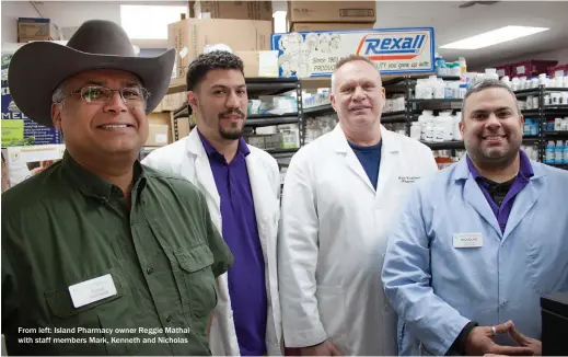  ??  ?? From left: Island Pharmacy owner Reggie Mathai with staff members Mark, Kenneth and Nicholas