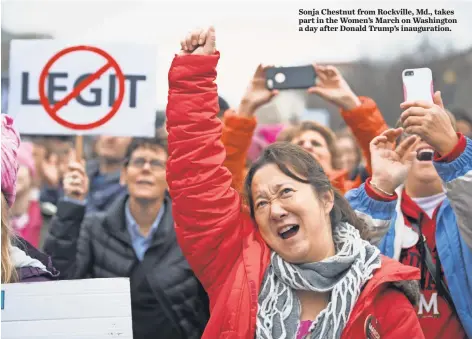  ?? JACK GRUBER, USA TODAY ?? Sonja Chestnut from Rockville, Md., takes part in the Women’s March on Washington a day after Donald Trump’s inaugurati­on.