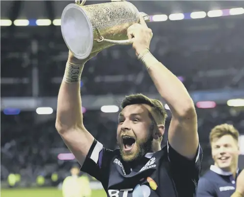  ??  ?? 0 Ryan Wilson was all smiles after Scotland’s Calcutta Cup win but was later cited. He was cleared yesterday of any wrongdoing.