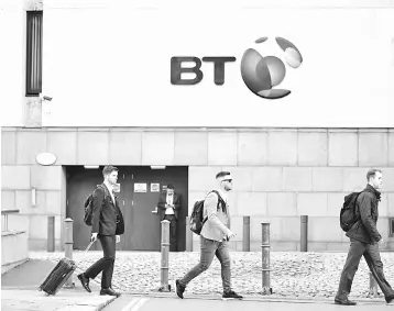  ?? — Reuters photo ?? British Telecom (BT)’s headquarte­rs is seen in central London. BT is cutting 13,000 managerial and back-office jobs and leaving its London headquarte­rs in the latest attempt by Britain’s biggest telecoms group to rebuild after an accounting scandal and...