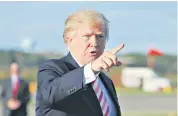  ?? /Foto: AP ?? Donald Trump antes de viajar a Alabama para un evento de apoyo ayer, luego de tuitear sobre Kim Jong-Un.