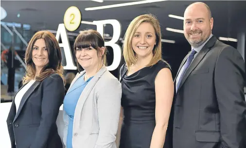  ??  ?? MOVING UP: From left, Karen Groat, Lisa Tait and Elizabeth Milne with managing partner Graeme Allan