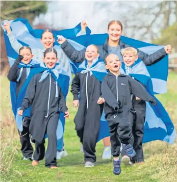  ??  ?? FLYING THE FLAG: Back row, from left: Ruby Flatley and Stella Reid; middle: Abigail Kettle, Millie Dunbar-Moncur, Chloe Bloice and Lily Bloice; front: Ella Bloice. Pictures by Steve MacDougall.