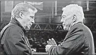  ?? AP FILE PHOTO ?? NFL Commission­er Roger Goodell (left) and Dallas Cowboys owner Jerry Jones talk during a Cowboys game in 2014 at Wembley Stadium in London. Jones confirmed he is backing off a threat of legal action over the future of Goodell.