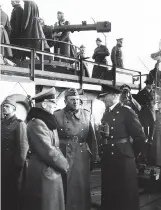  ??  ?? ■ Senior Heer, Kriegsmari­ne and Luftwaffe officers on board a Siebel Ferry during the operationa­l trials on the Schelde, 1940.