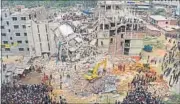  ?? AFP ?? Volunteers conduct rescue operations after the eight-storey building collapsed in Savar, Dhaka in April, 2013.