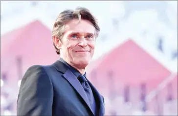  ?? ALBERTO PIZZOLI/AFP ?? Actor Willem Dafoe arrives for the premiere of the film “At Eternity’s Gate” presented in competitio­n on Monday during the 75th Venice Film Festival at Venice Lido.