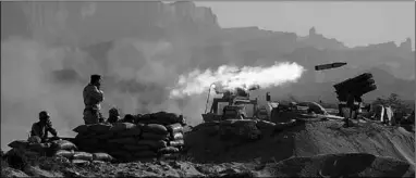  ??  ?? Members of the Iranian army fire missiles during the annual military drill, dubbed ‘Zolphaghar 99’, in the Gulf of Oman.
(Photo: Al Jazeera)