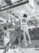  ?? JOVANNY HERNANDEZ / MILWAUKEE JOURNAL SENTINEL ?? UW-Milwaukee forward Ahmad Rand, seen in a previous game, led the Panthers with 13 points Thursday against UW-Green Bay.