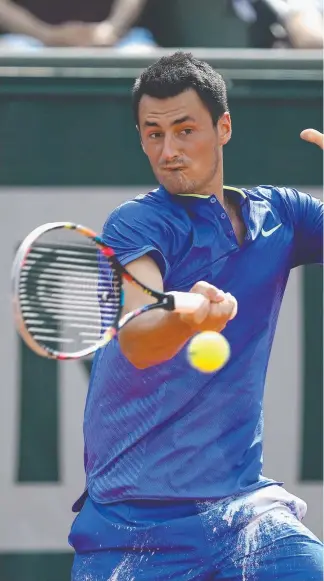  ??  ?? Bernard Tomic could do little in his French Open opening-round loss. Picture: GETTY IMAGES