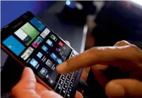  ?? — Reuters ?? BlackBerry said software and services unit revenue was $156 million in its second quarter ended on August 31.