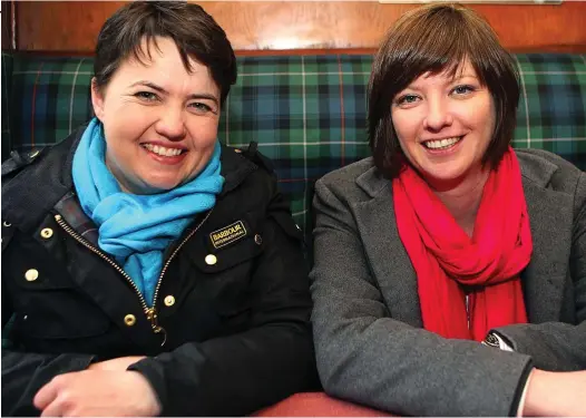  ??  ?? Marriage plans: Scottish Conservati­ve leader Ruth Davidson, left, proposed to her fiancée Jen Wilson during a trip to Paris