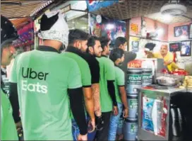  ??  ?? Since launching in India in 2017, Uber Eats has struggled to gain market share and is a distant third to Tencent Holdings-backed Swiggy and Zomato. MINT
