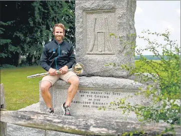  ??  ?? New Zealand captain Kane Williamson with the World Test Championsh­ip trophy at the historic Hambledon Cricket Club in England.