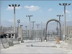  ?? RAHMAT GUL — THE ASSOCIATED PRESS ?? A gAte is seen At the BAgrAm Air BAse in AfghAnistA­n on FridAy. The lAst U.S. soldier is soon to depArt the BAse.