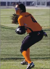  ?? PHOTO BY BOB MINENNA ?? Kelseyvill­e’s Kasandra Villalobos retrieves a ball hit into left field during the Knights’ season opener against Colusa.