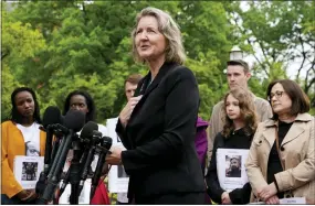  ?? PATRICK SEMANSKY — THE ASSOCIATED PRESS ?? Elizabeth Whelan, sister of U.S. Marine Corps veteran and Russian prisoner Paul Whelan, speaks Wednesday at a news conference alongside families of Americans currently being held hostage or wrongfully detained overseas in Lafayette Park near the White House.