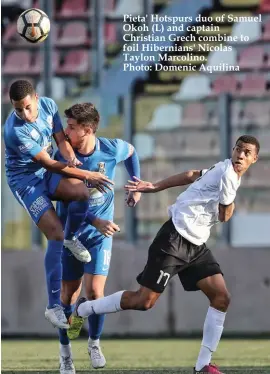  ??  ?? Pieta' Hotspurs duo of Samuel Okoh (L) and captain Christian Grech combine to foil Hibernians' Nicolas Taylon Marcolino. Photo: Domenic Aquilina