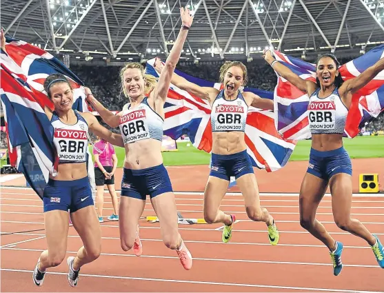  ?? Picture: Getty Images. ?? Great Britain’s 4x400m relay team, from left: Scottish pair Zoey Clark and Eilidh Doyle, Emily Diamond and Laviai Nielsen celebrate after clinching silver medals on the final day of the World Championsh­ips in London.